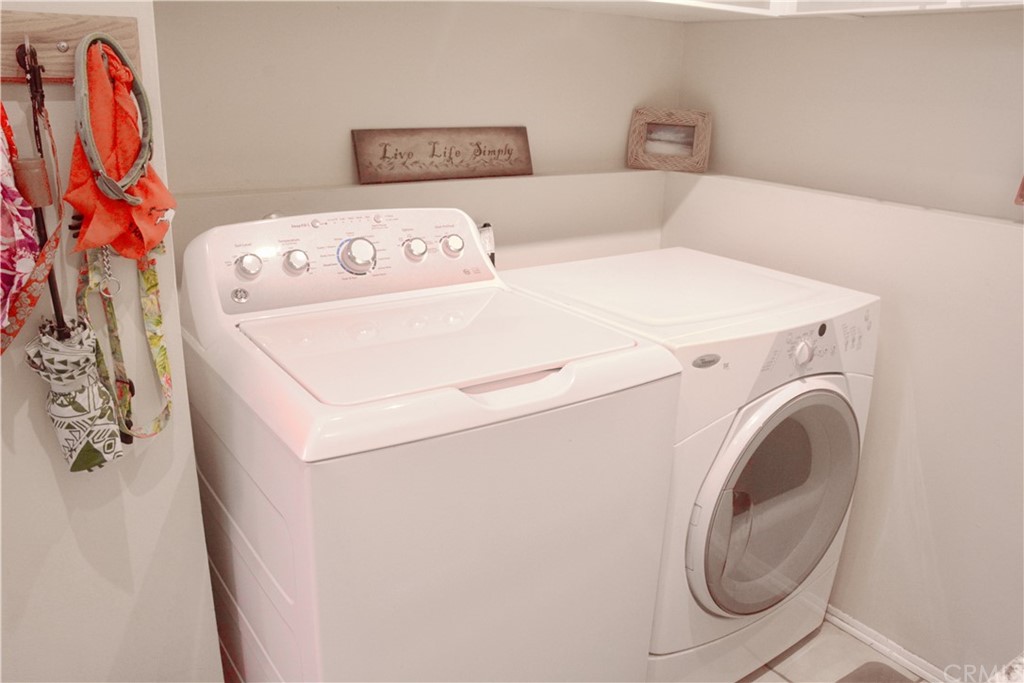 6038 KOA Drive Rialto, CA 92377 - Photo 14 of 18 a utility room with dryer and washer