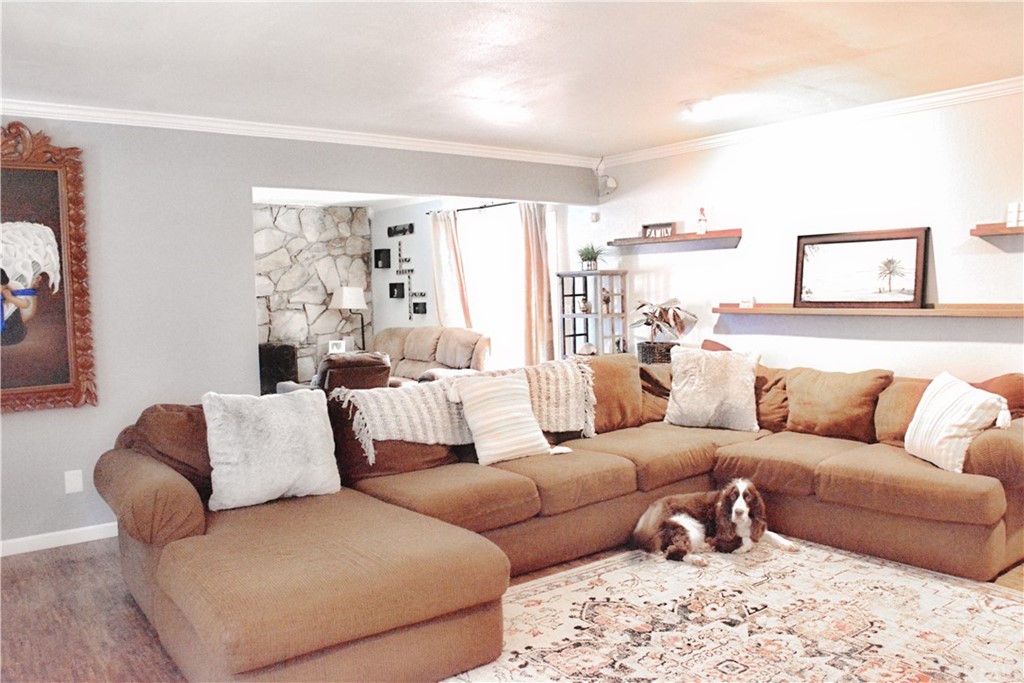 6038 KOA Drive Rialto, CA 92377 - Photo 4 of 18 a living room with furniture and a large window