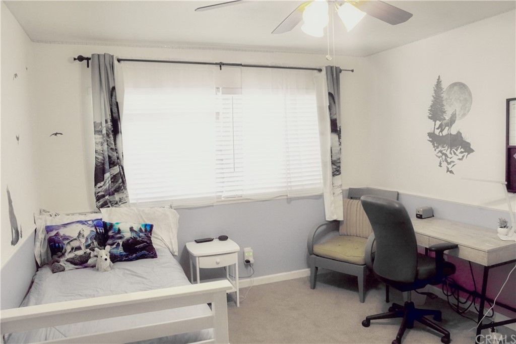 6038 KOA Drive Rialto, CA 92377 - Photo 9 of 18 a bathroom with a sink and a mirror