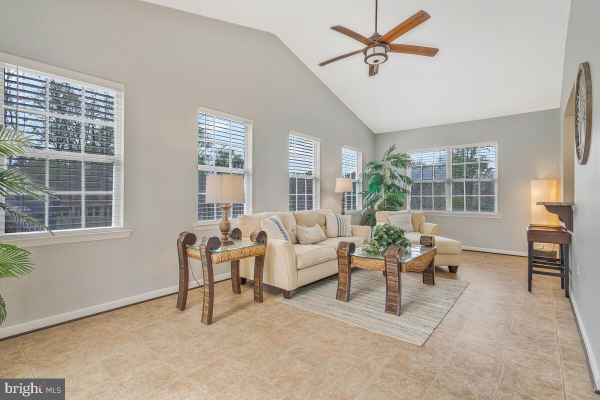2066 Baythorne Road Prince Frederick, MD 20678 - Photo 20 of 54 a living room with furniture ceiling fan and a window