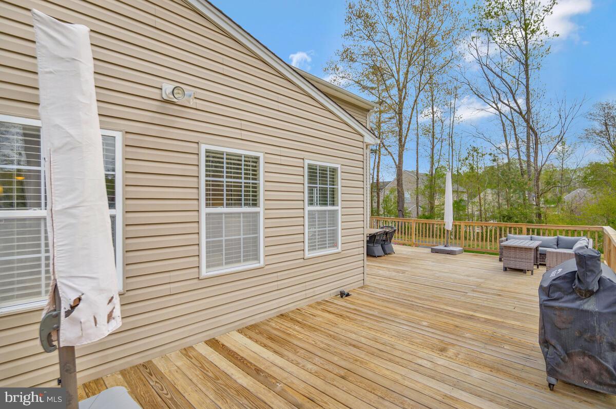 2066 Baythorne Road Prince Frederick, MD 20678 - Photo 54 of 54 a view of a house with backyard and sitting area