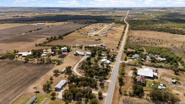 a view of a swimming pool with an outdoor seating