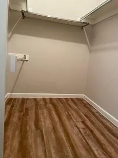 a view of a room with racks on the wall