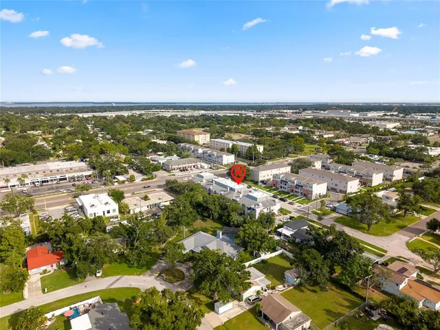 a front view of a building with garden
