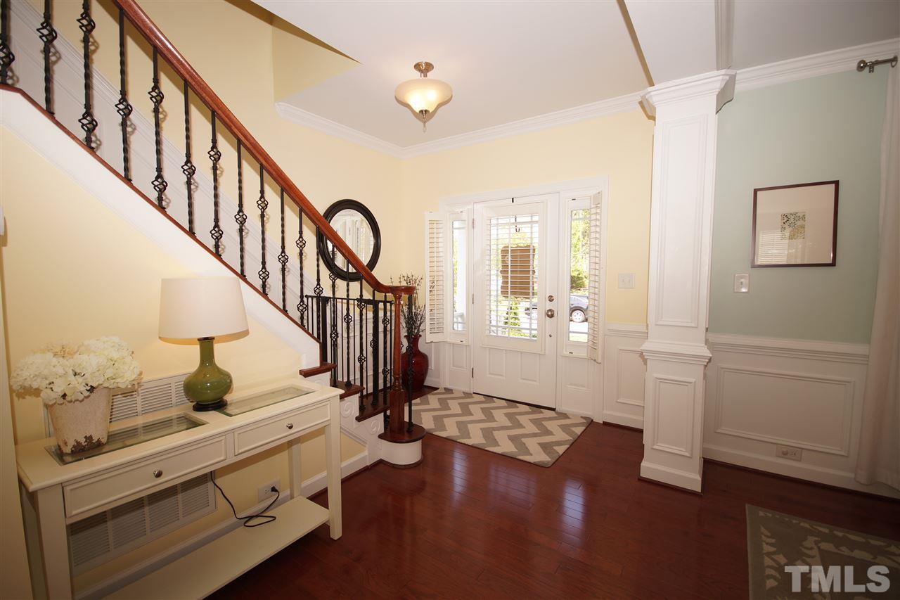 3015 Red Grape Drive Raleigh, NC 27607 - Photo 2 of 25 a view of entryway with livingroom and wooden floor