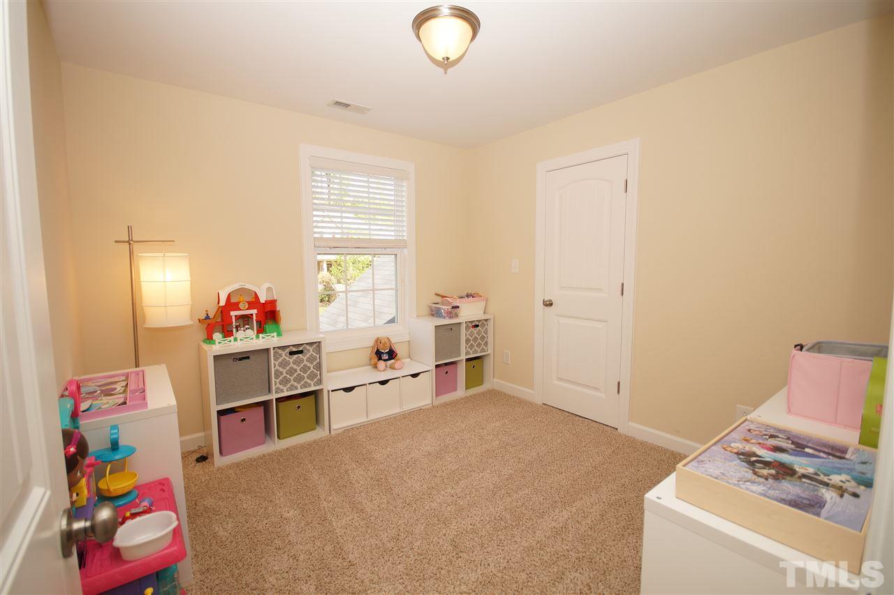 3015 Red Grape Drive Raleigh, NC 27607 - Photo 15 of 25 a very nice looking room with a large window