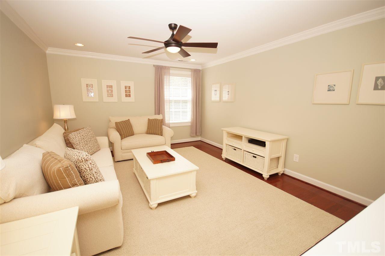 3015 Red Grape Drive Raleigh, NC 27607 - Photo 20 of 25 a living room with furniture and a window