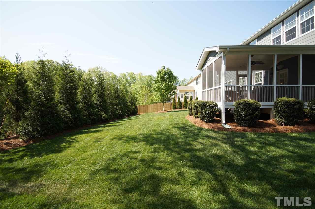 3015 Red Grape Drive Raleigh, NC 27607 - Photo 24 of 25 a front view of a house with garden