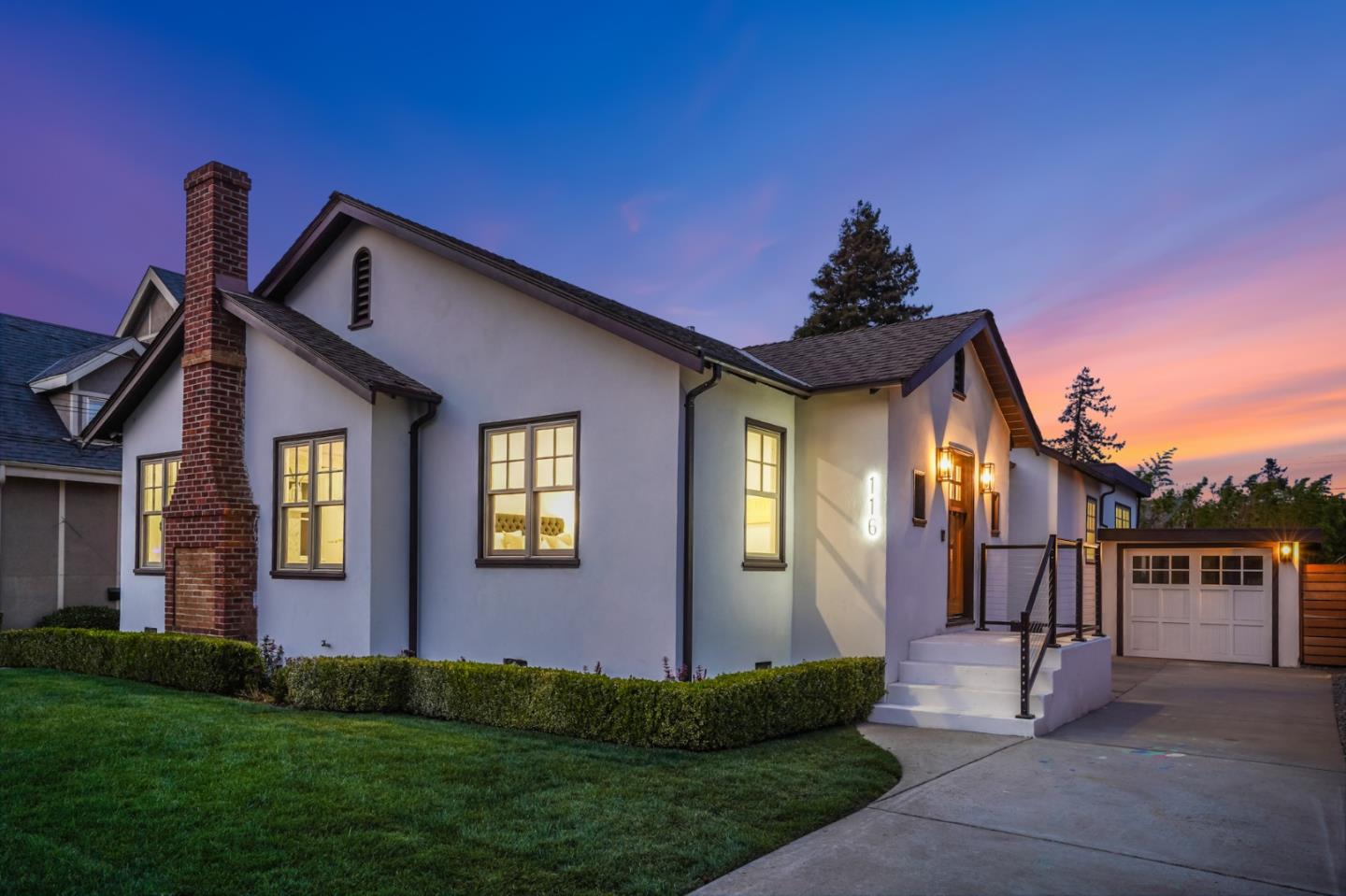 116 Channing Road Burlingame, CA 94010 - Photo 2 of 10 a view of a house with many windows and plants