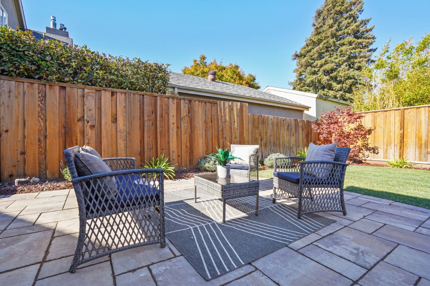 116 Channing Road Burlingame, CA 94010 - Photo 8 of 10 an outdoor sitting area with furniture and garden