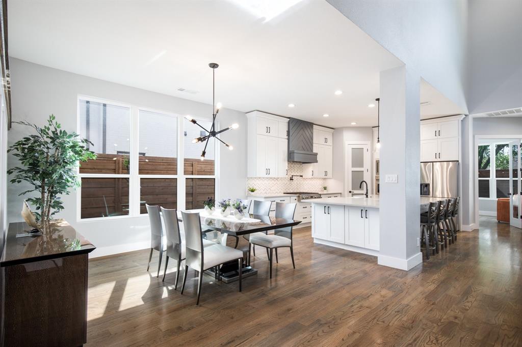 2093 Holt Way Grapevine, TX 76051 - Photo 11 of 40 a view of a dining room and livingroom with furniture wooden floor a chandelier