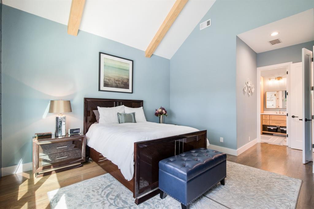 2093 Holt Way Grapevine, TX 76051 - Photo 16 of 40 a bedroom with a bed and a couch