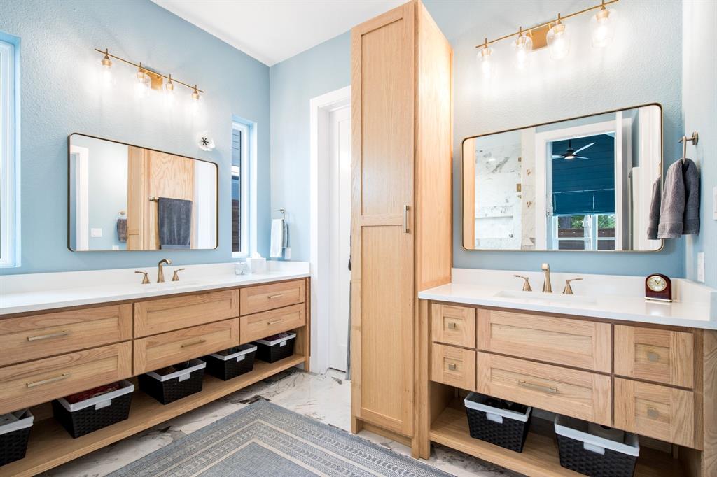 2093 Holt Way Grapevine, TX 76051 - Photo 18 of 40 a bathroom with a double vanity sink and mirror