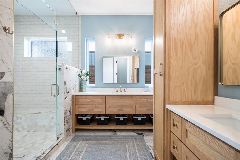 2093 Holt Way Grapevine, TX 76051 - Photo 19 of 40 a bathroom with a double vanity sink and a mirror