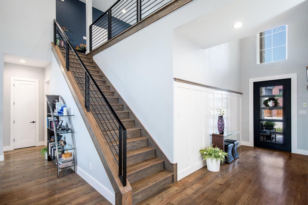 2093 Holt Way Grapevine, TX 76051 - Photo 22 of 40 a view of an entryway with wooden floor and stairs