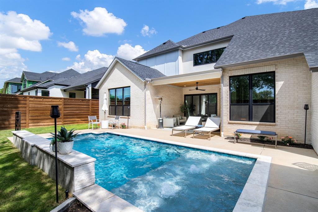 2093 Holt Way Grapevine, TX 76051 - Photo 32 of 40 a view of a house with backyard and sitting area