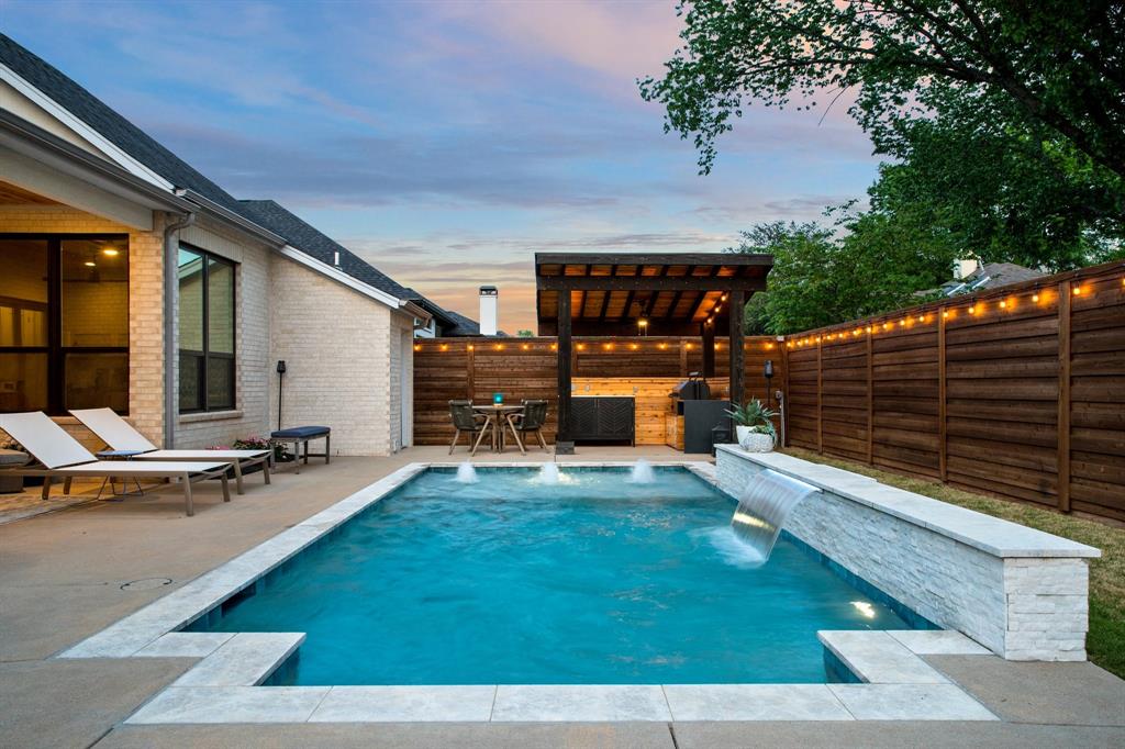 2093 Holt Way Grapevine, TX 76051 - Photo 38 of 40 a view of a patio with chairs and a table