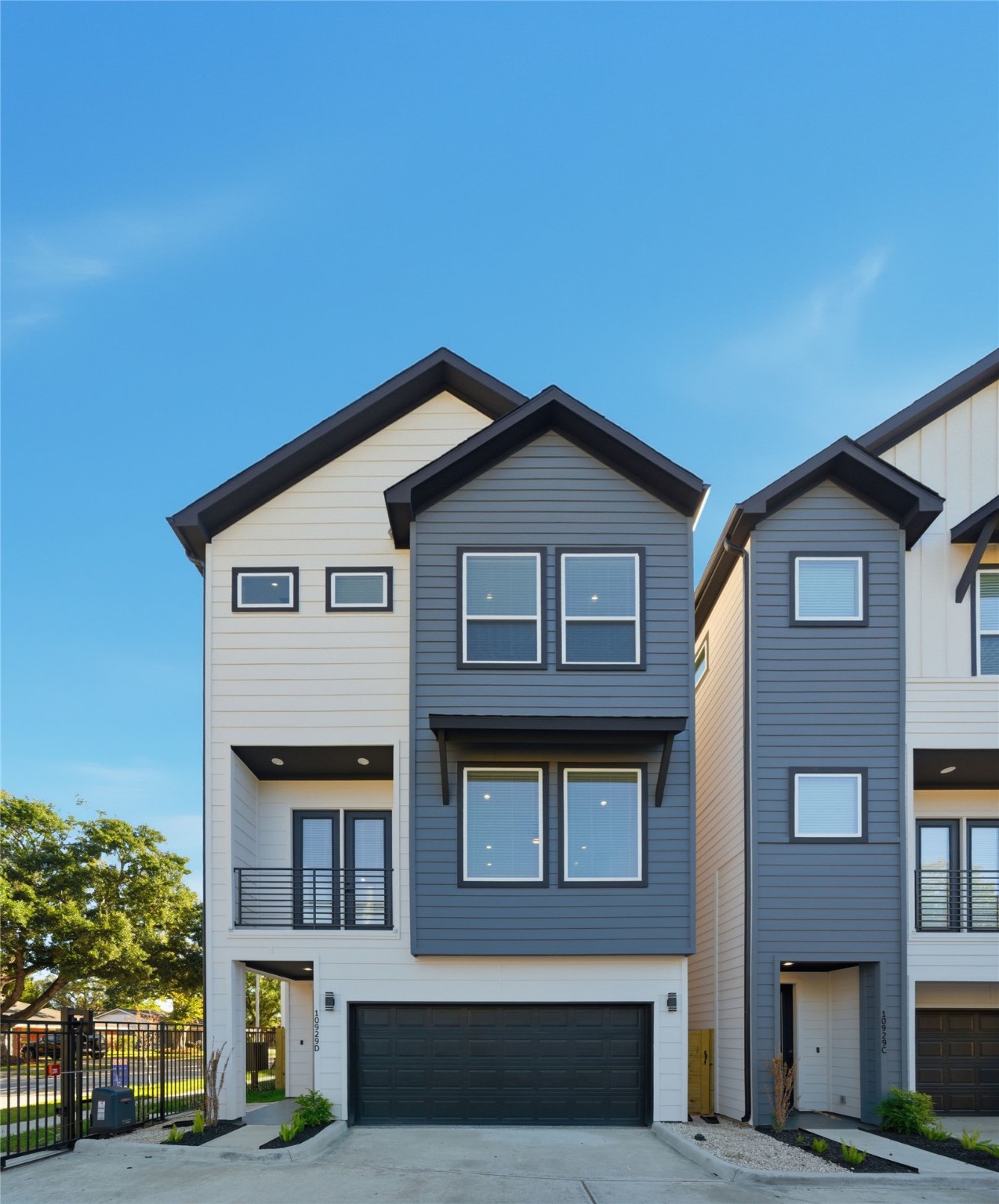 10929 Ivyridge Road, Unit B Houston, TX 77043 - Photo 1 of 37 a front view of a house with a yard
