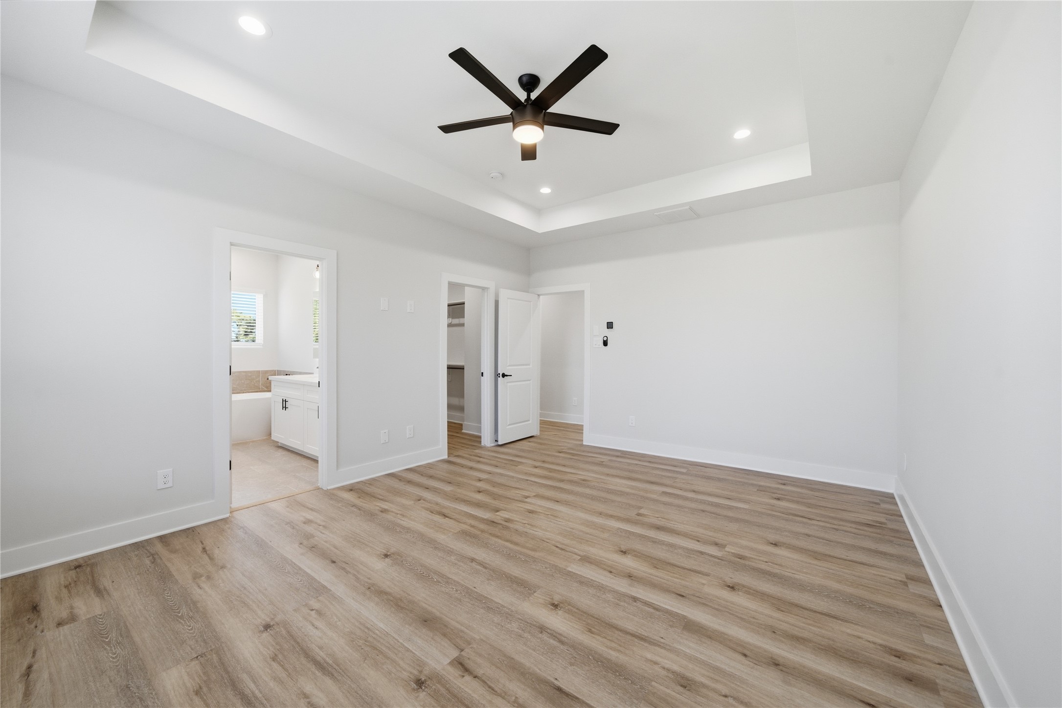 10929 Ivyridge Road, Unit B Houston, TX 77043 - Photo 18 of 37 a view of empty room with wooden floor