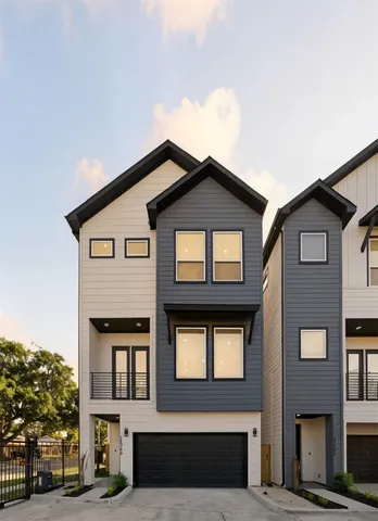 a bathroom with a tub and shower