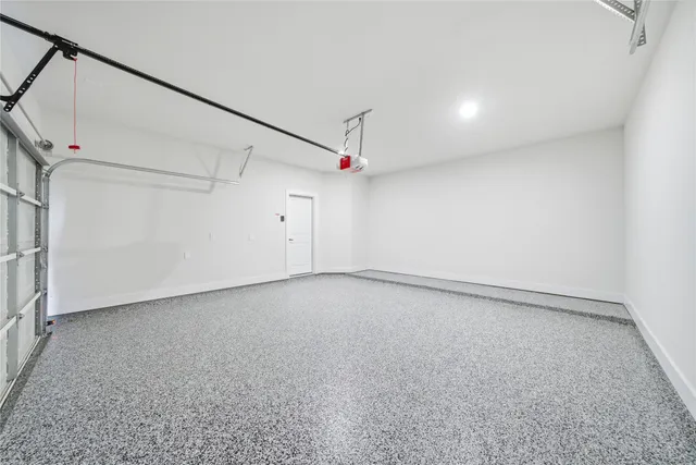 a bathroom with a tub a sink and a shower