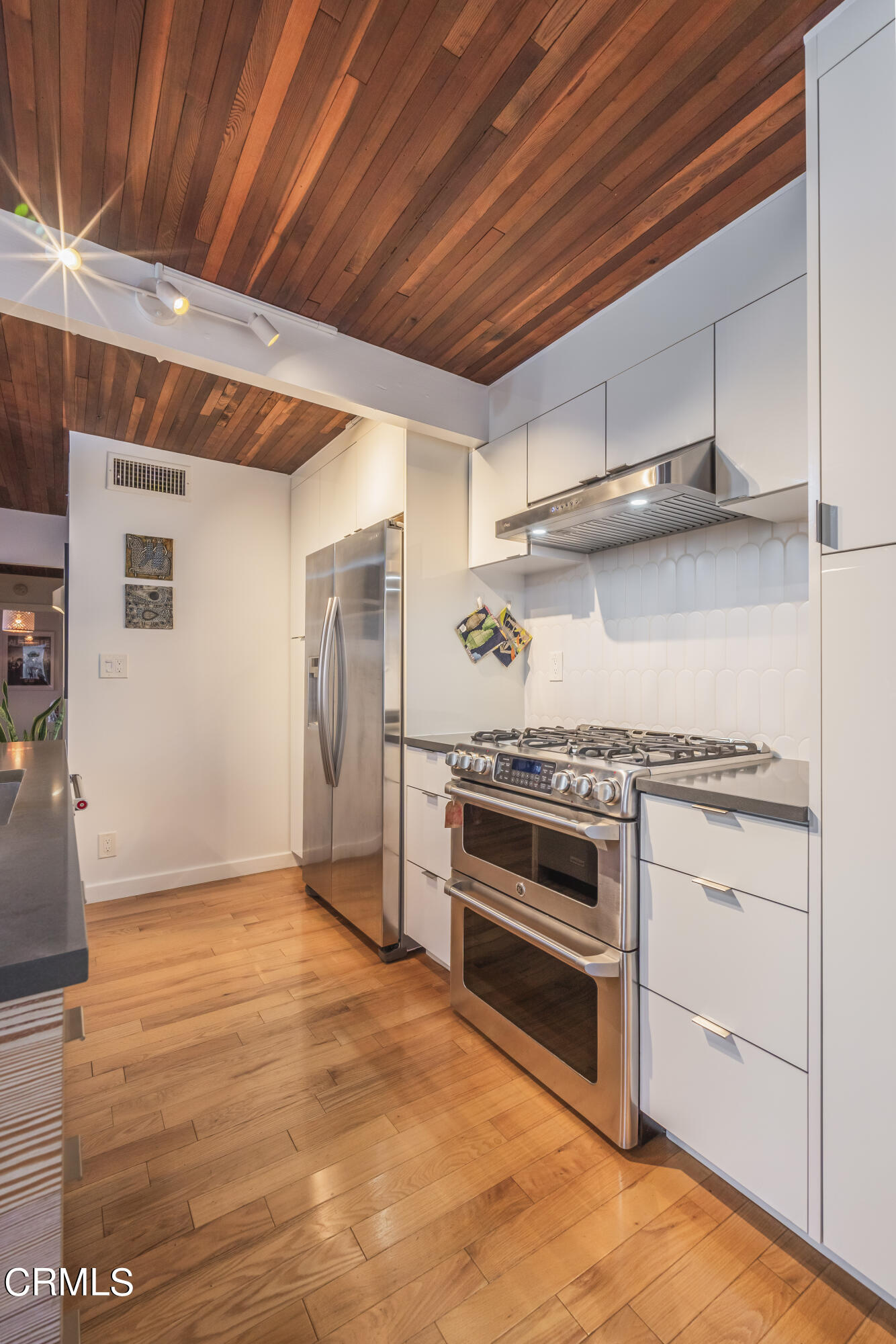 444 Sequoia Drive Pasadena, CA 91105 - Photo 11 of 38 a kitchen with a stove and a refrigerator
