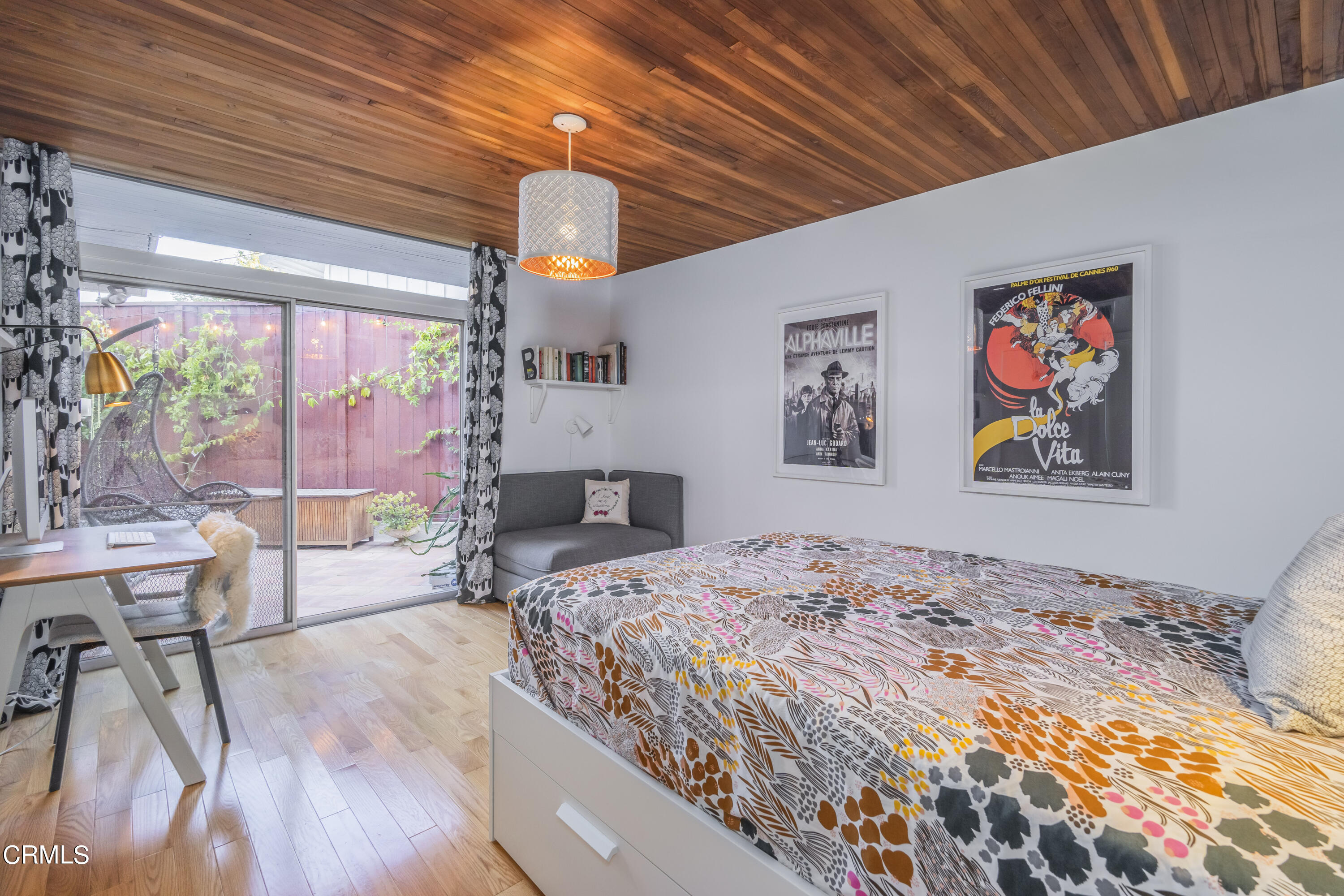 444 Sequoia Drive Pasadena, CA 91105 - Photo 16 of 38 a bedroom with a bed and wooden floor