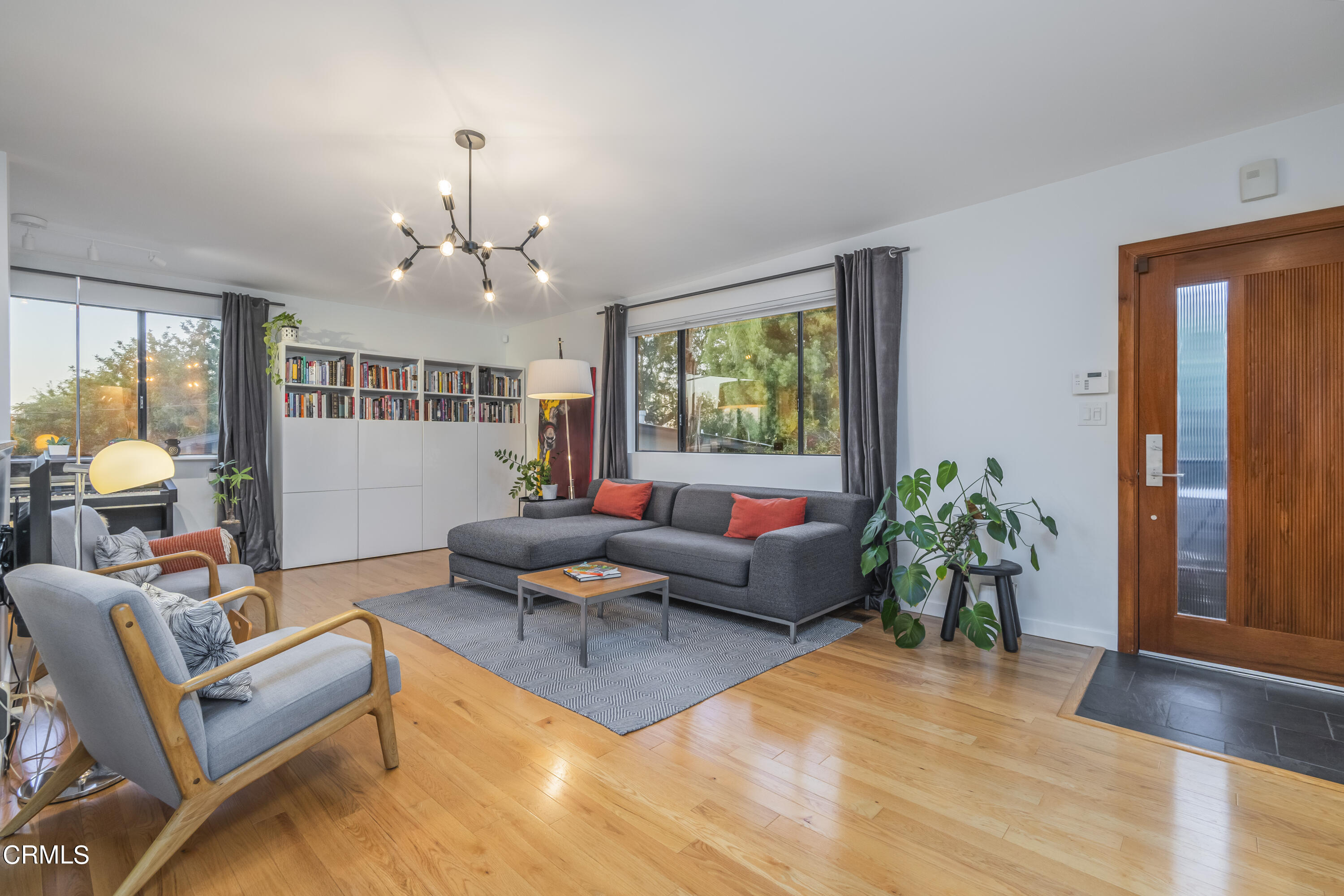 444 Sequoia Drive Pasadena, CA 91105 - Photo 22 of 38 a living room with furniture and a chandelier