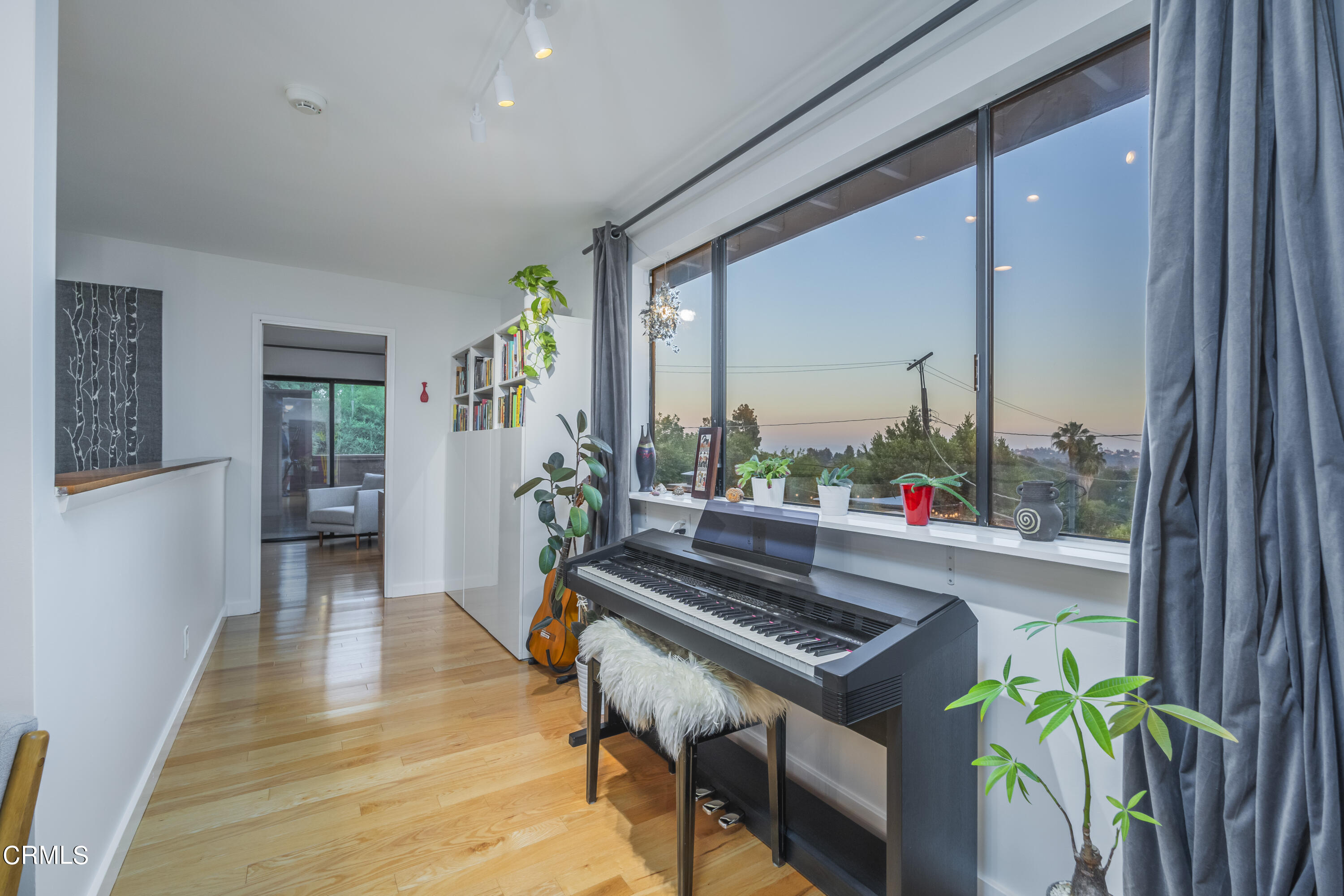 444 Sequoia Drive Pasadena, CA 91105 - Photo 26 of 38 a living room with furniture and a potted plant