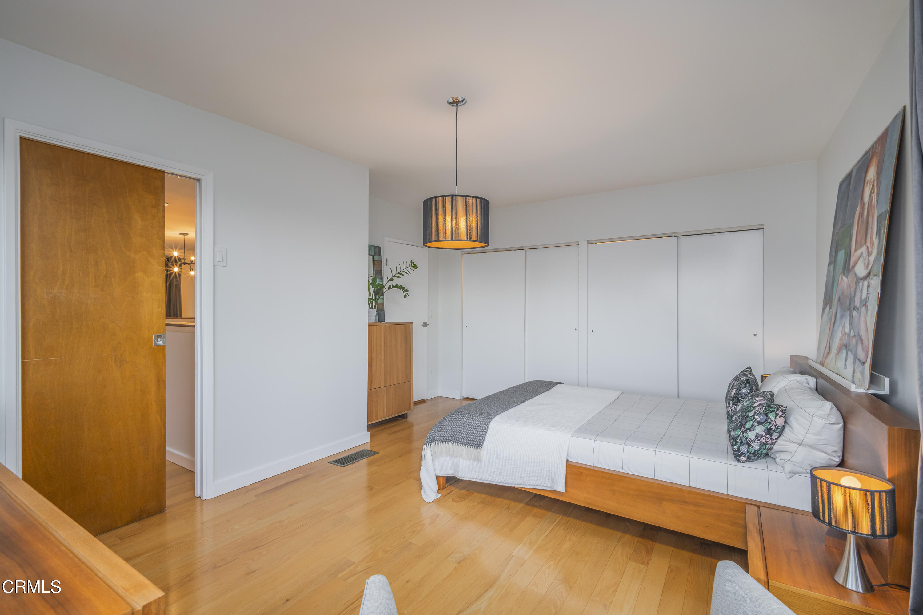 444 Sequoia Drive Pasadena, CA 91105 - Photo 29 of 38 a bedroom with a bed and a dresser in it