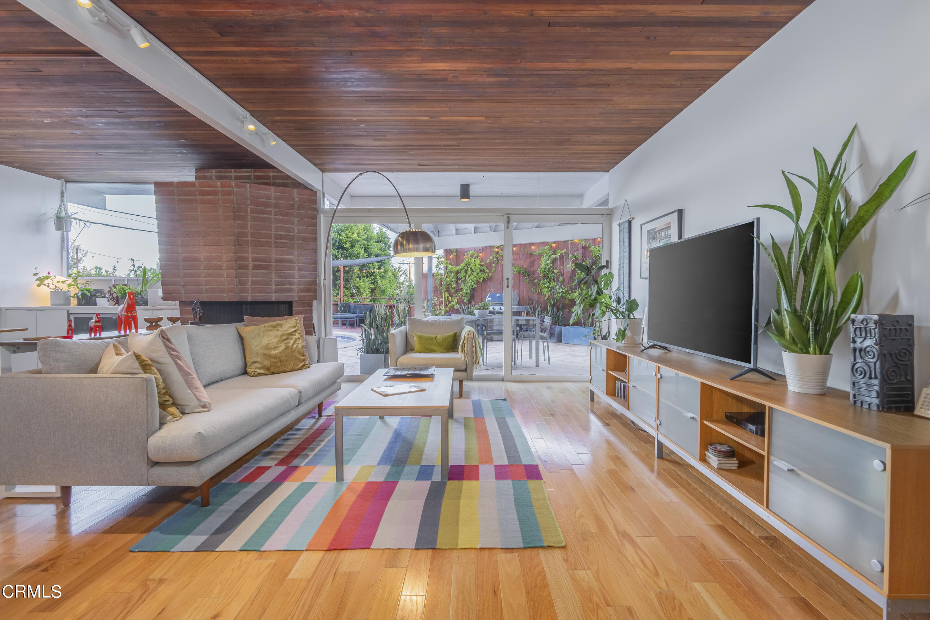 444 Sequoia Drive Pasadena, CA 91105 - Photo 4 of 38 a living room with furniture and a flat screen tv