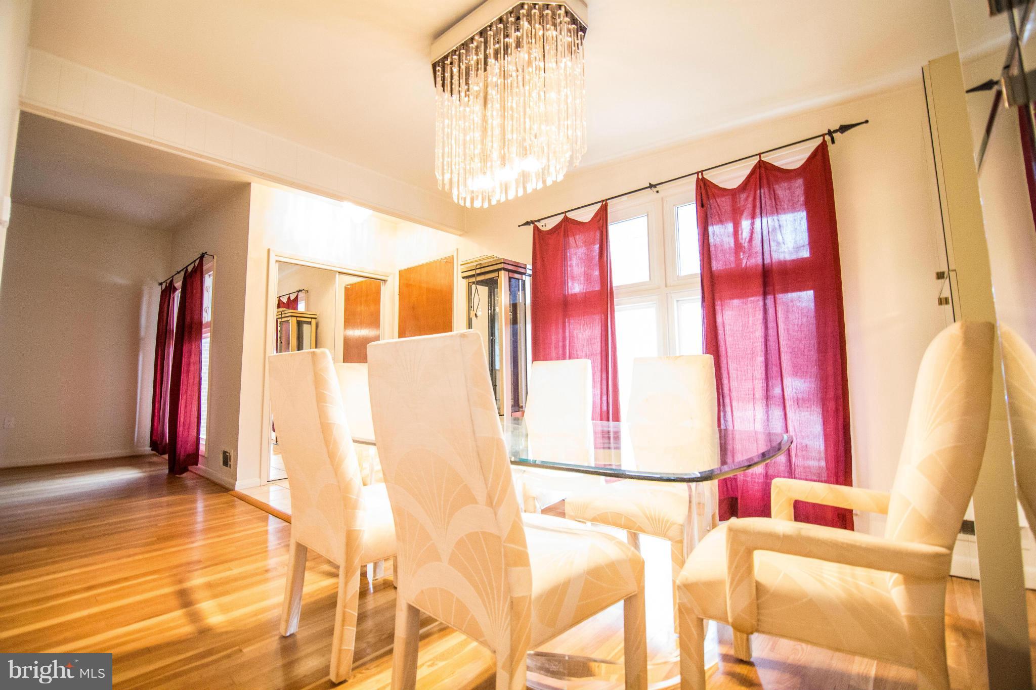 6834 Queens Ferry Road Baltimore, MD 21239 - Photo 3 of 21 Dining Room w/ nice light coming in