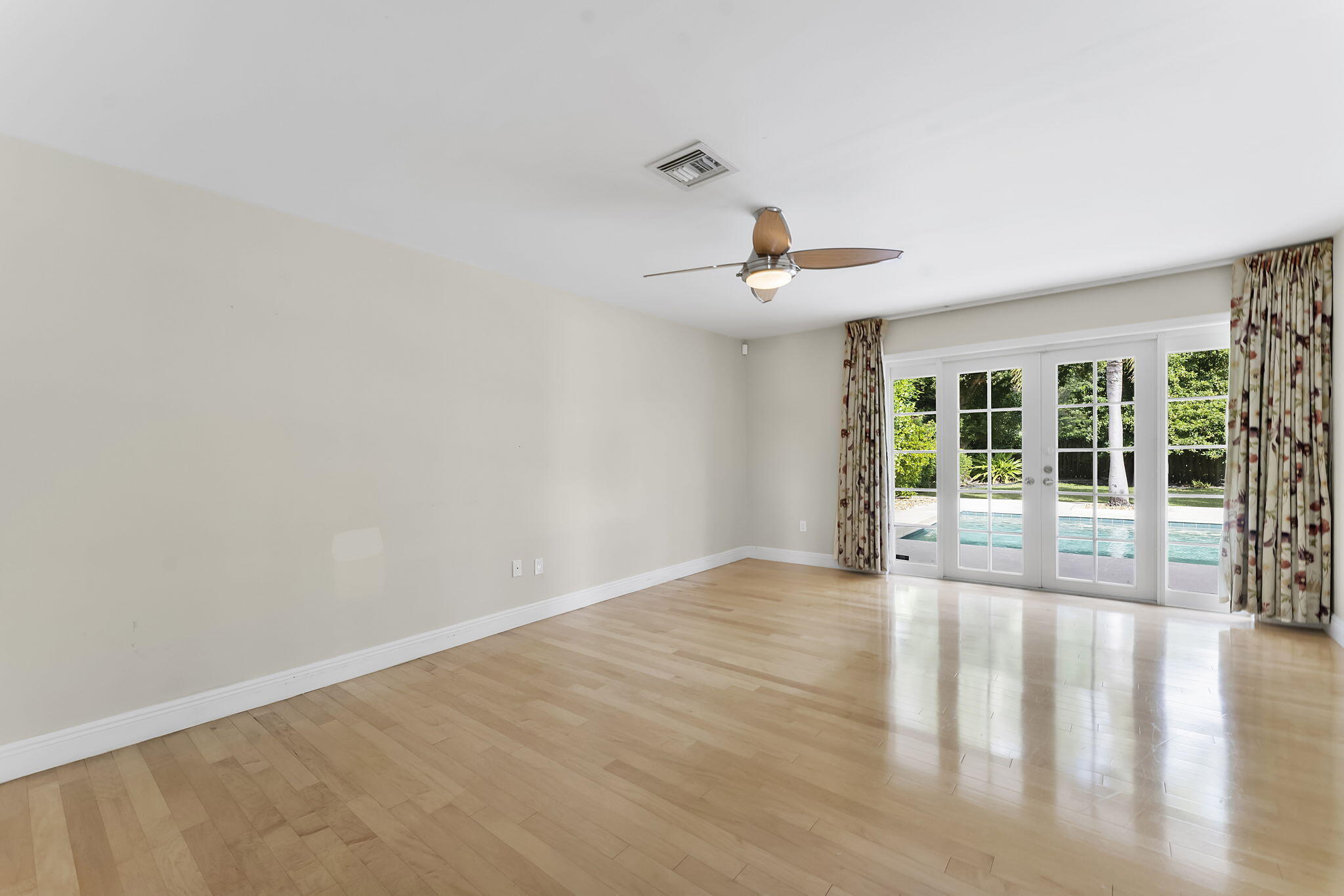 2415 Northwest 31st Street Boca Raton, FL 33431 - Photo 14 of 41 a view of an empty room with a window