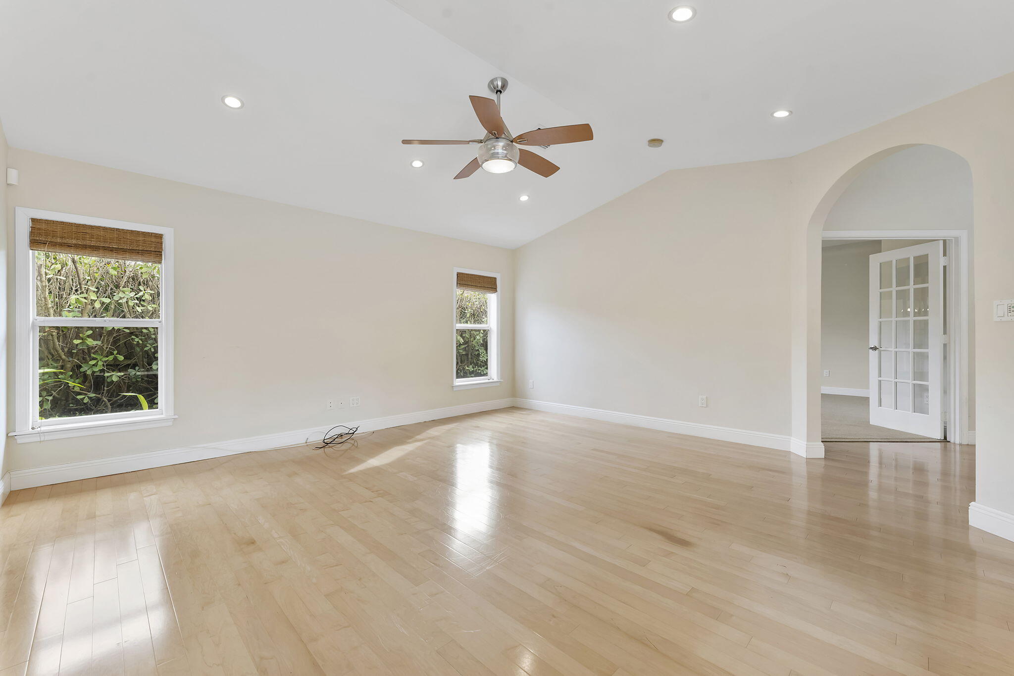 2415 Northwest 31st Street Boca Raton, FL 33431 - Photo 29 of 41 wooden floor in an empty room with a window