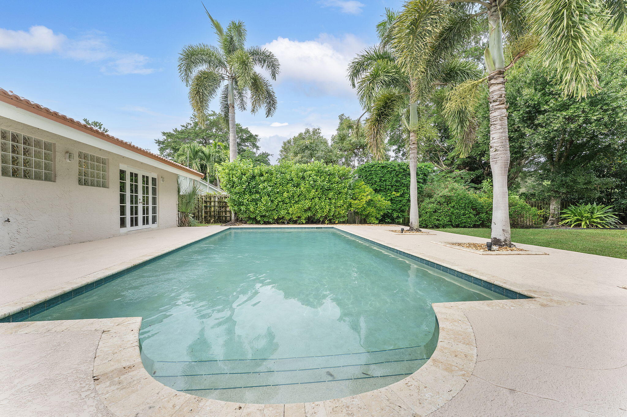 2415 Northwest 31st Street Boca Raton, FL 33431 - Photo 33 of 41 a view of a house with a yard