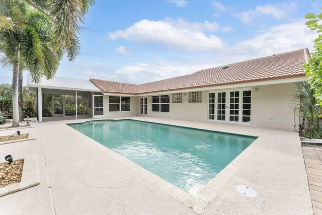 a view of a house with swimming pool