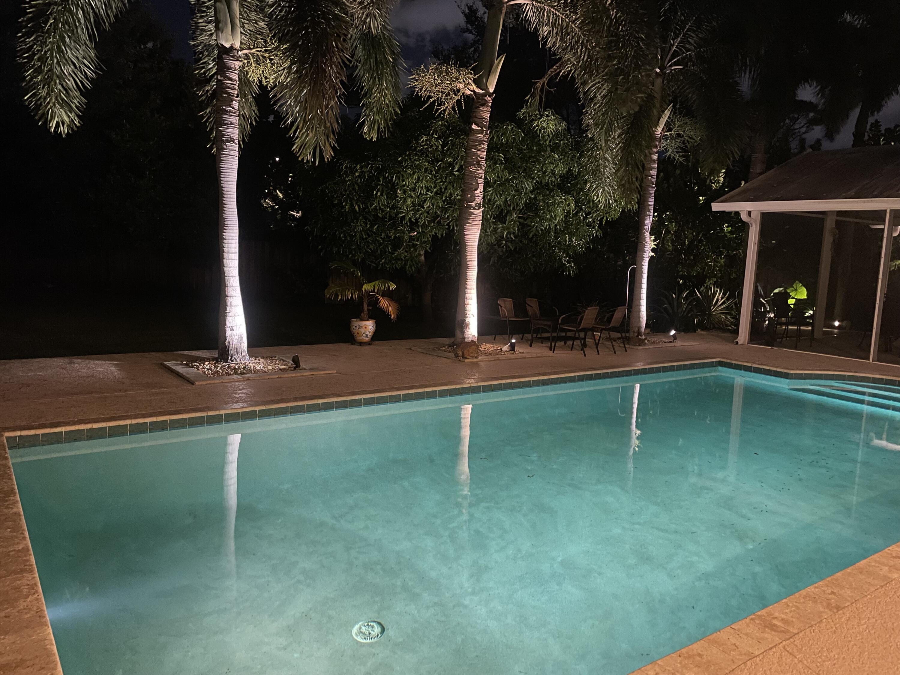 2415 Northwest 31st Street Boca Raton, FL 33431 - Photo 41 of 41 swimming pool view with a seating space
