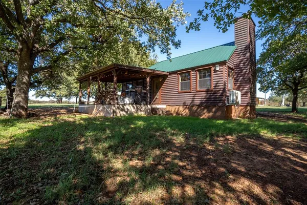 a view of a porch with a yard
