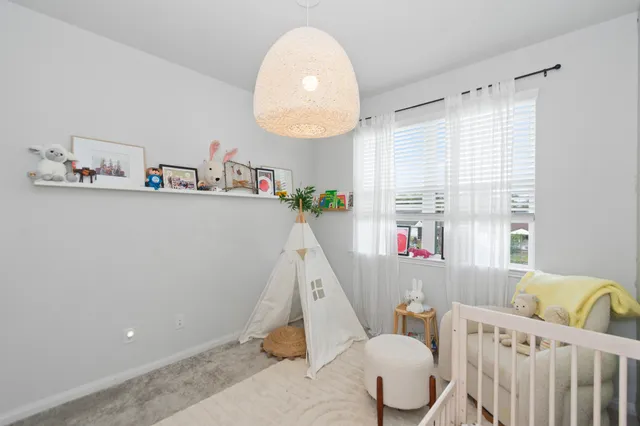 a bathroom with a double vanity sink mirror double and bathtub
