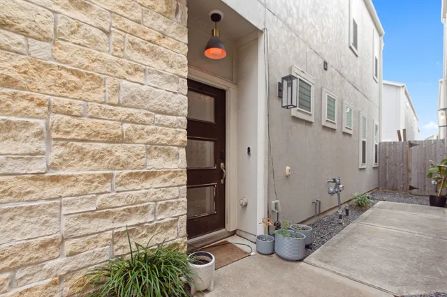 a view of a brick wall with an empty room