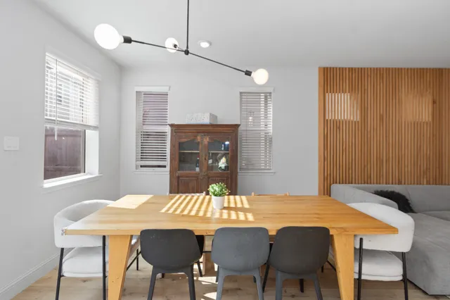 a view of a dining room with furniture