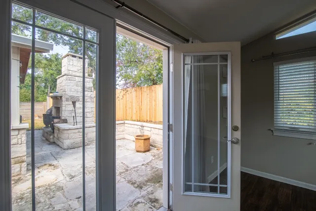 a bathroom with a glass shower door