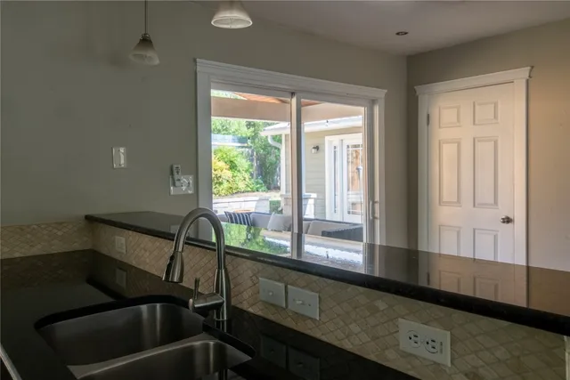 a view of a chair and table in a room