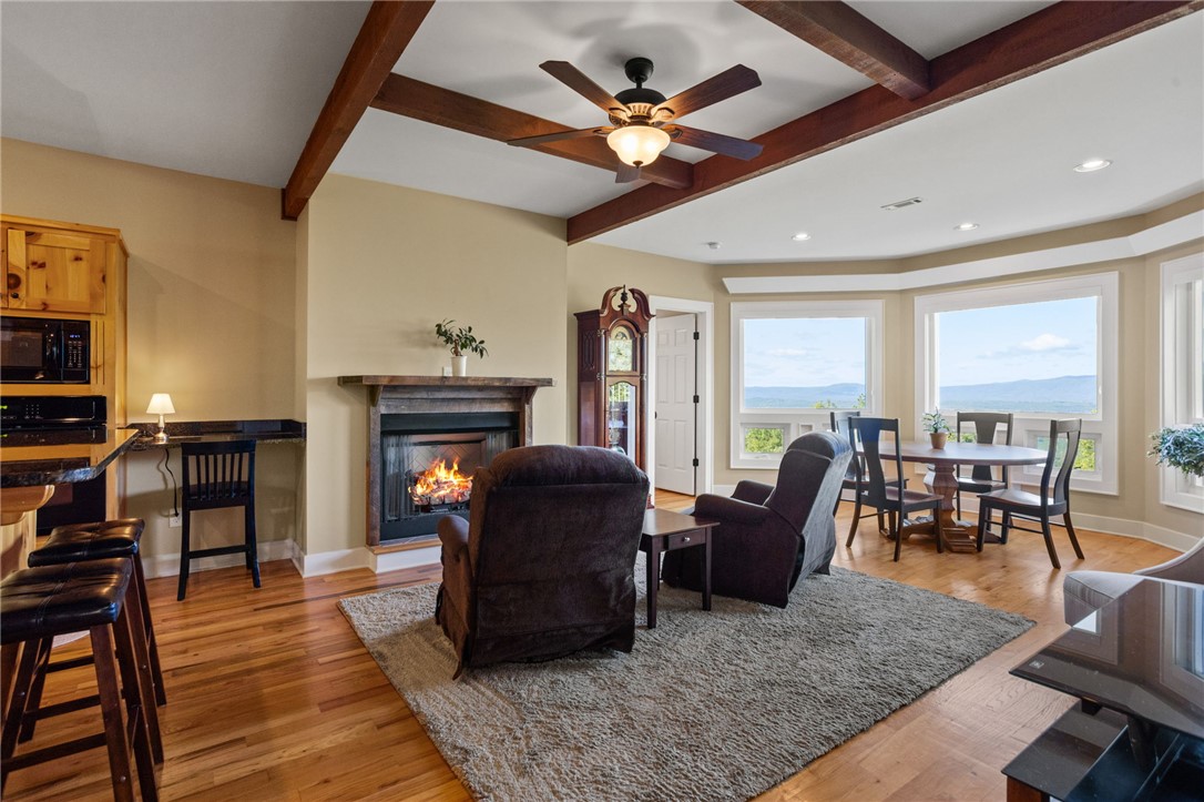 271 Jocassee Ridge Way Salem, SC 29676 - Photo 19 of 50 Living / dining room with gas log fire place