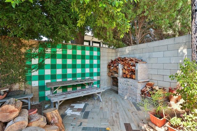 a garden view with a seating space