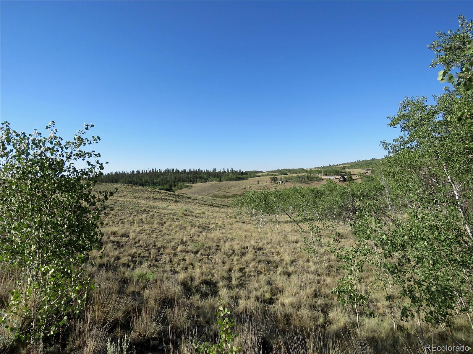 104 Hawk Way Como, CO 80432 - Photo 7 of 19 a view of a field with an ocean