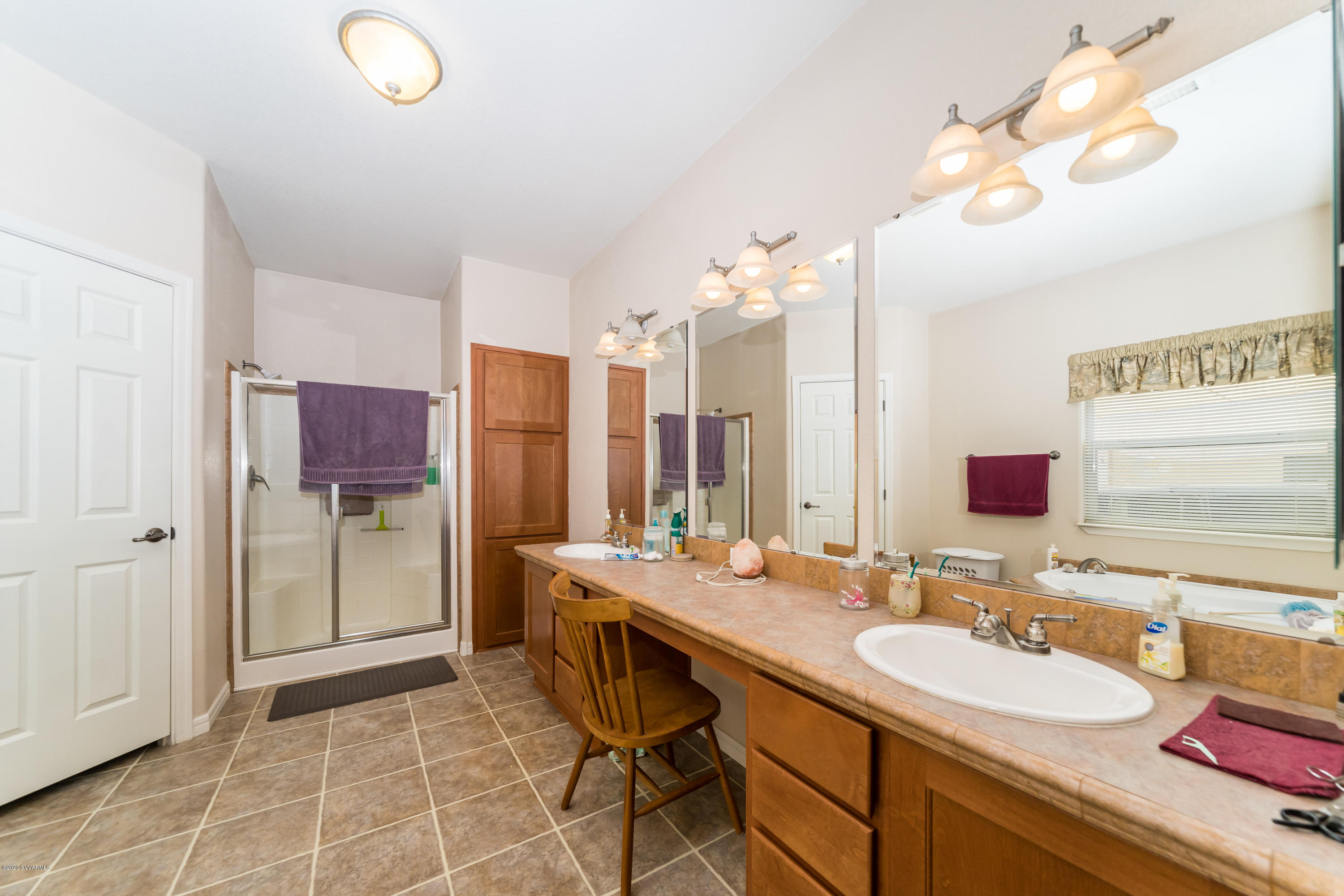 2995 North Coach Road Rimrock, AZ 86335 - Photo 13 of 25 a bathroom with a sink double vanity and a mirror