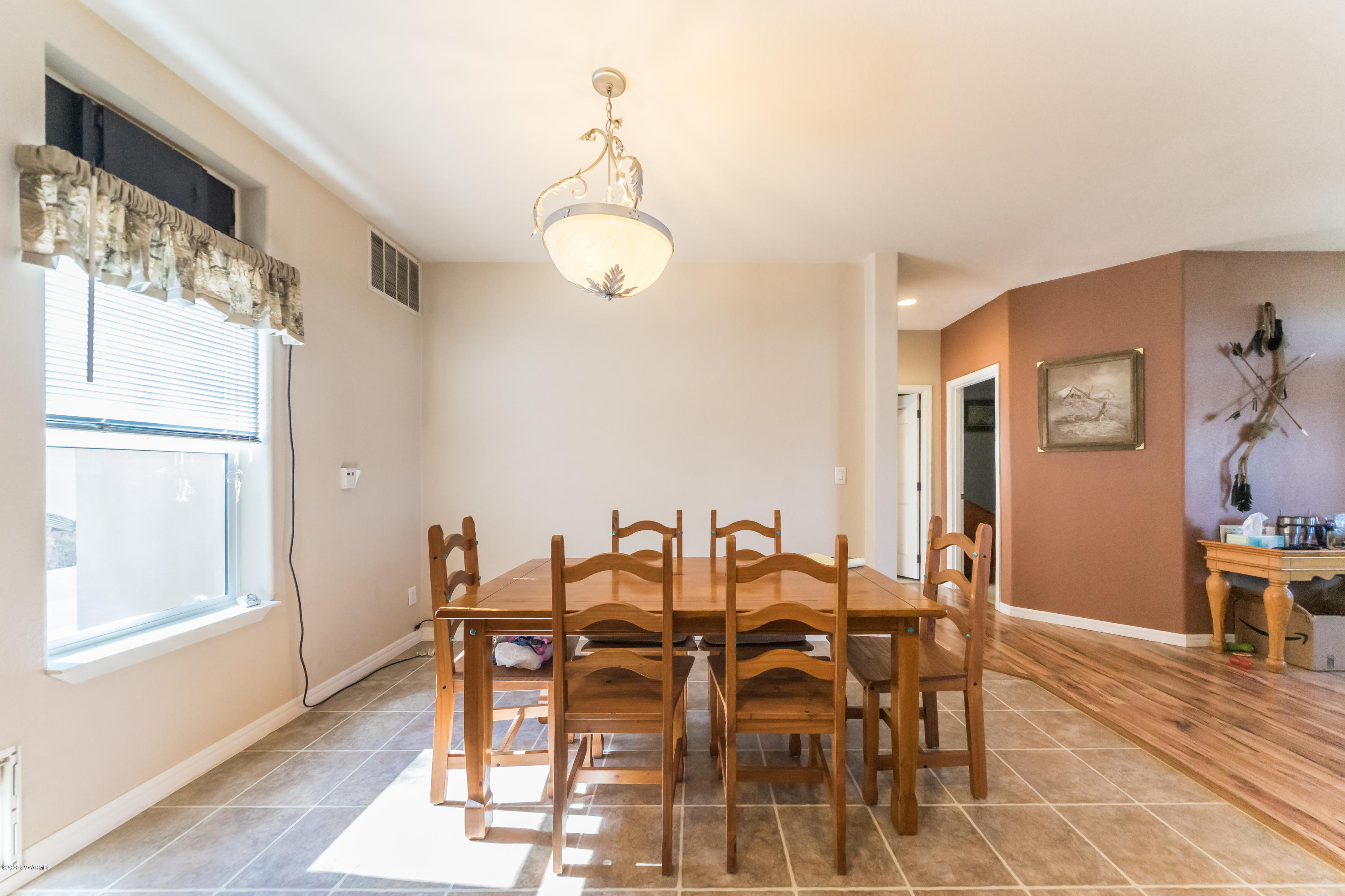 2995 North Coach Road Rimrock, AZ 86335 - Photo 10 of 25 a view of a dining room with furniture and wooden floor