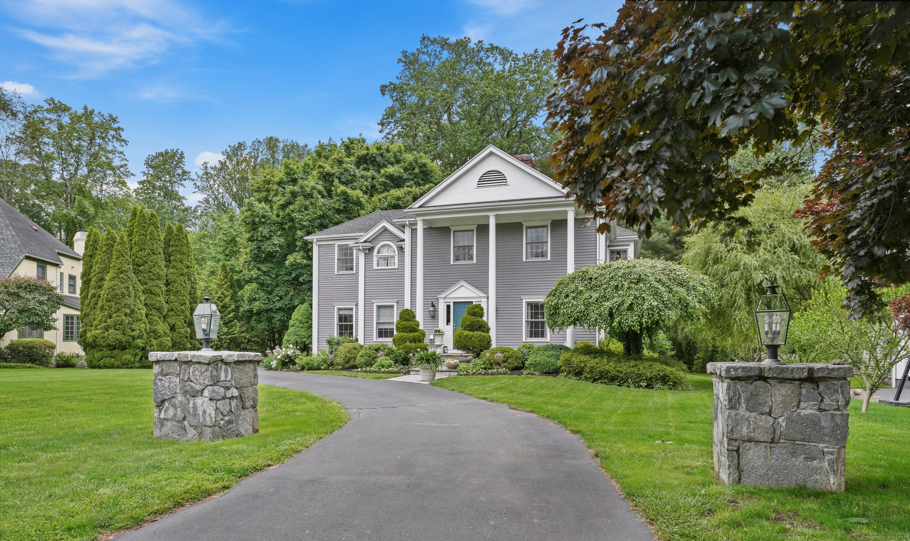 28 Eagle Drive Fairfield, CT 06825 - Photo 1 of 1 a front view of a house with a yard