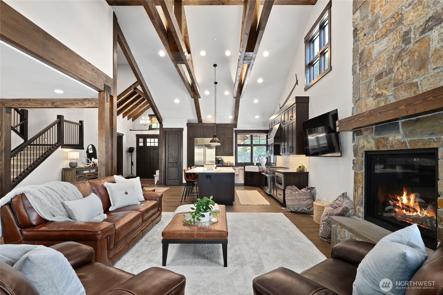 120 Rocky Run Loop Cle Elum, WA 98922 - Photo 9 of 37 a living room with furniture a fireplace and a flat screen tv